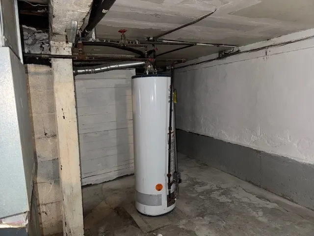 a kitchen with a refrigerator and a sink