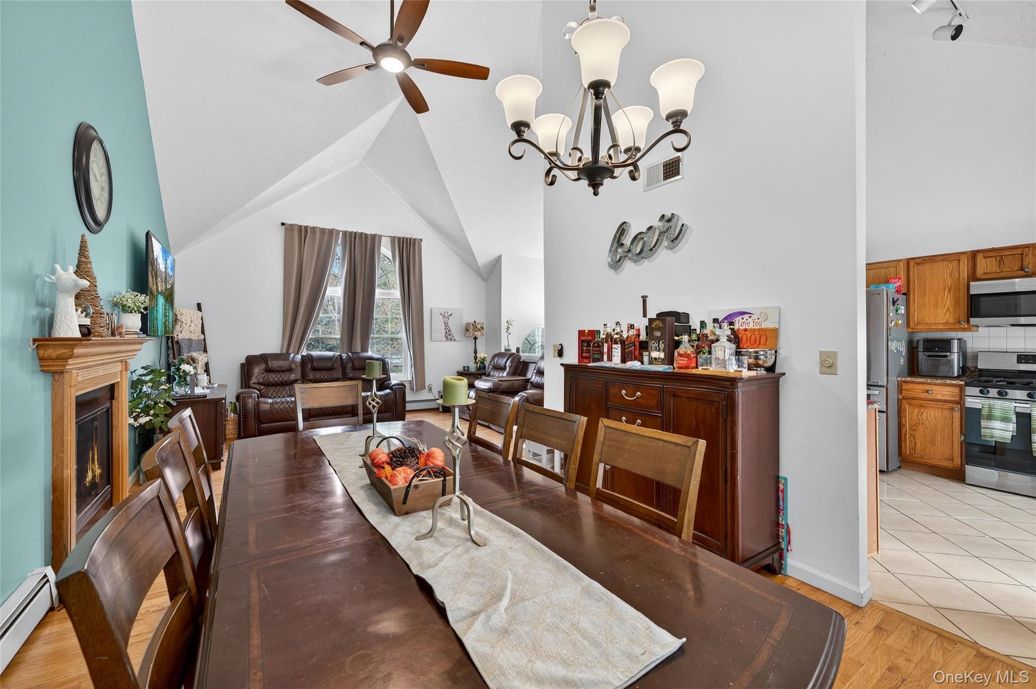 2 Berkeley Court Highland Mills, NY 10930 - Photo 13 of 44 a very nice looking room with a large kitchen view and a wooden floor