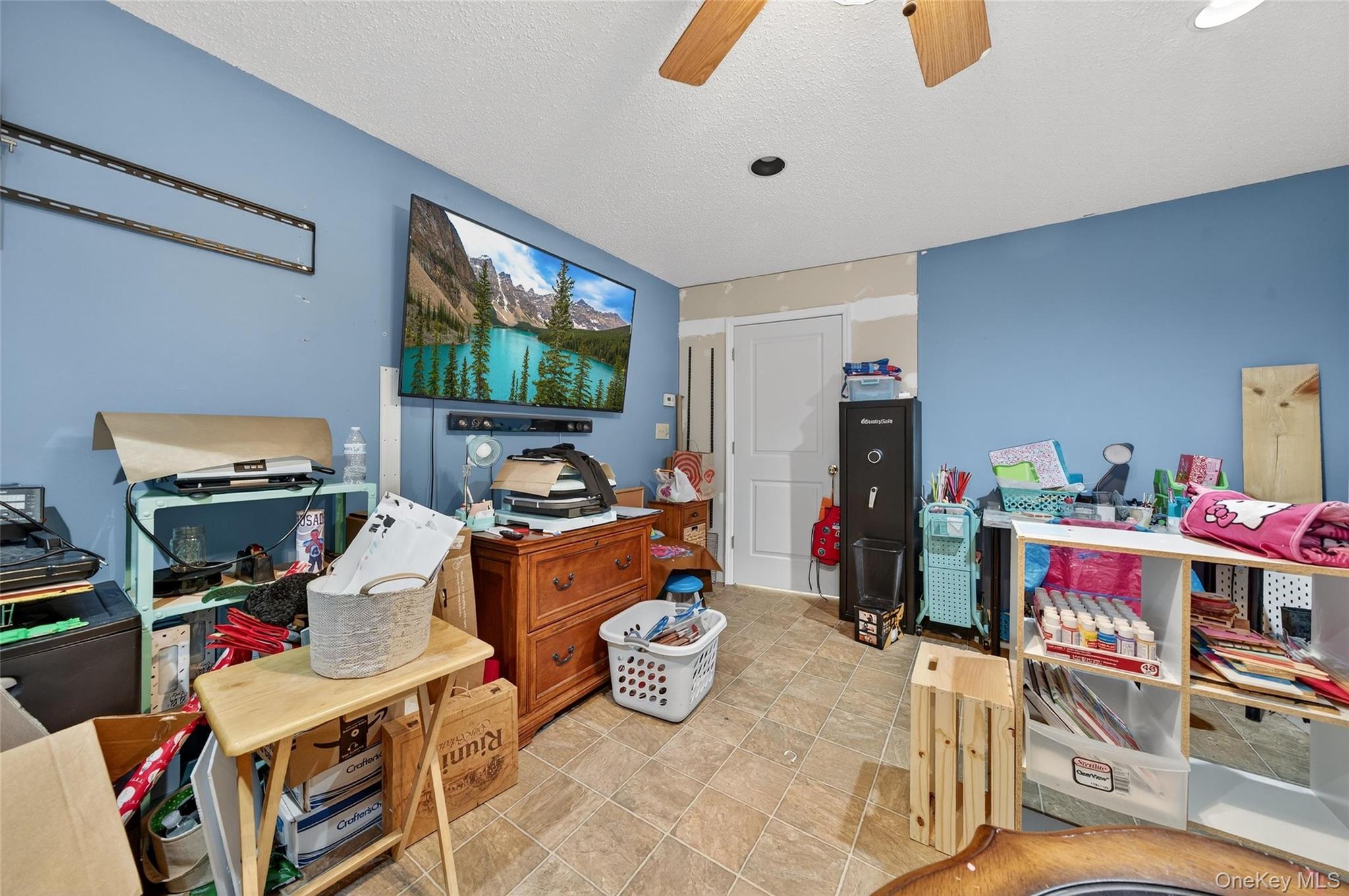 2 Berkeley Court Highland Mills, NY 10930 - Photo 31 of 44 a room with furniture and a flat screen tv