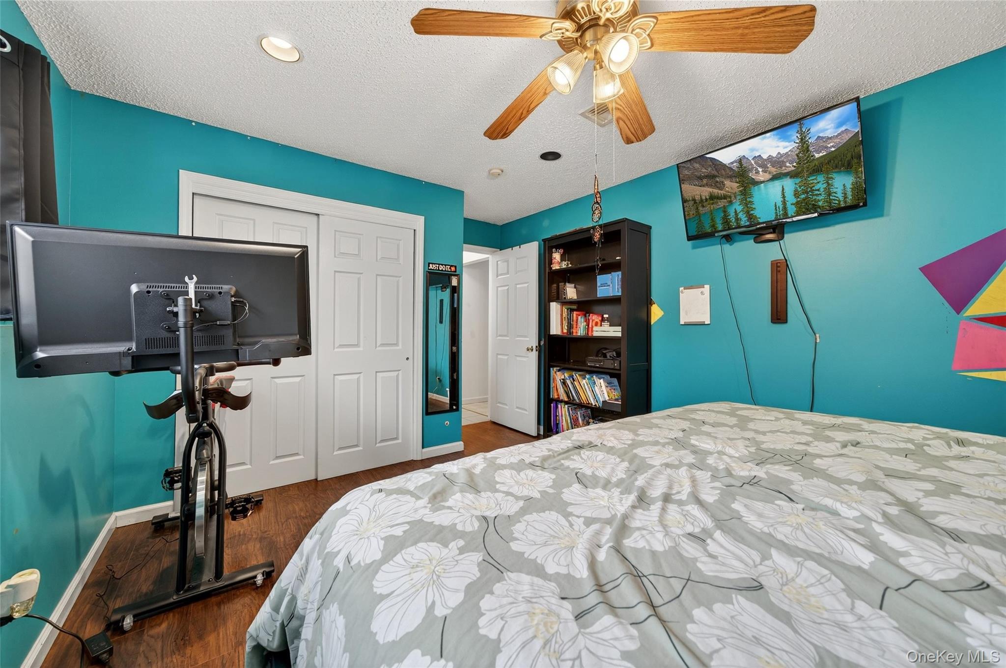 2 Berkeley Court Highland Mills, NY 10930 - Photo 33 of 44 a bedroom with a bed and a flat screen tv