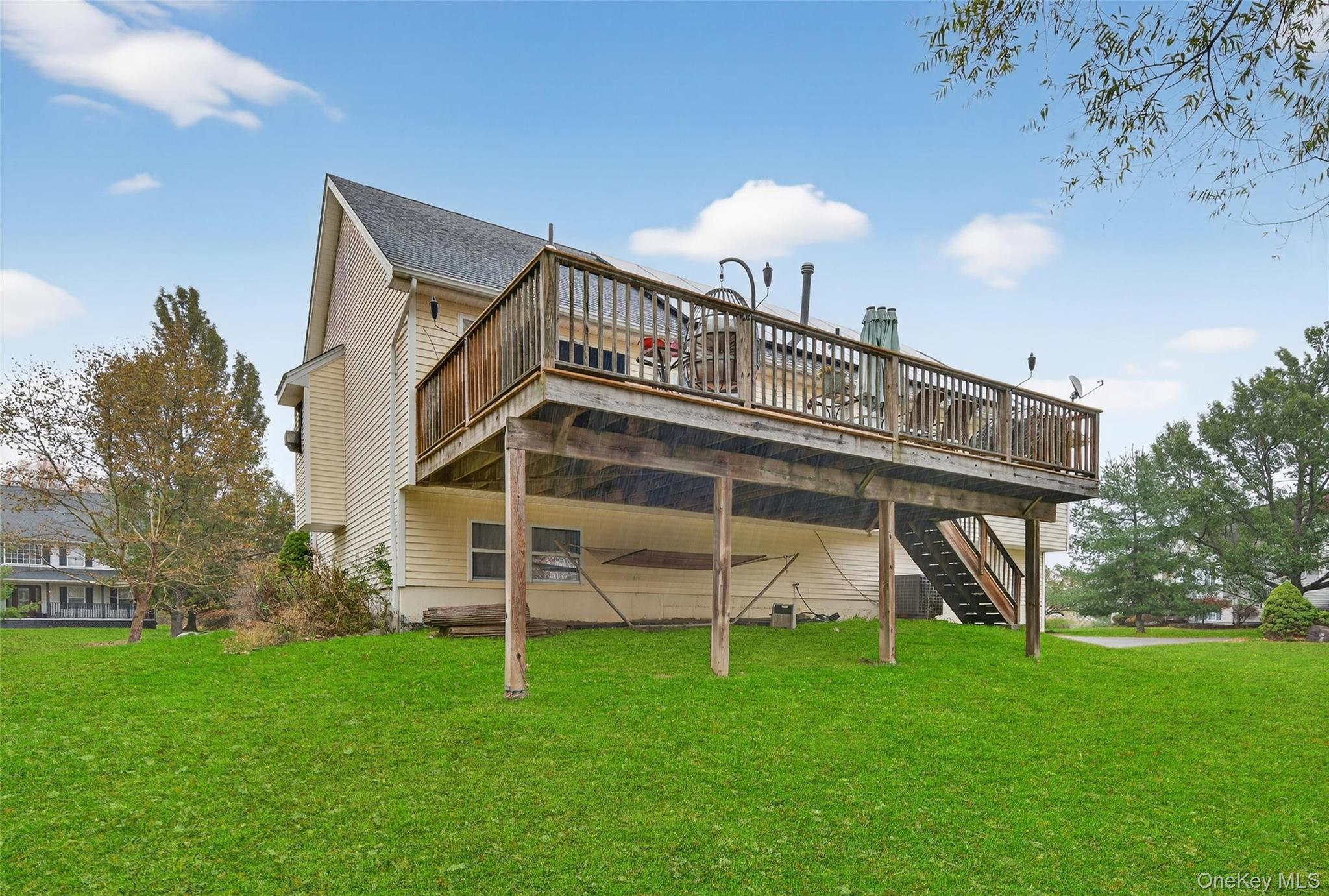 2 Berkeley Court Highland Mills, NY 10930 - Photo 43 of 44 a view of a house with a yard