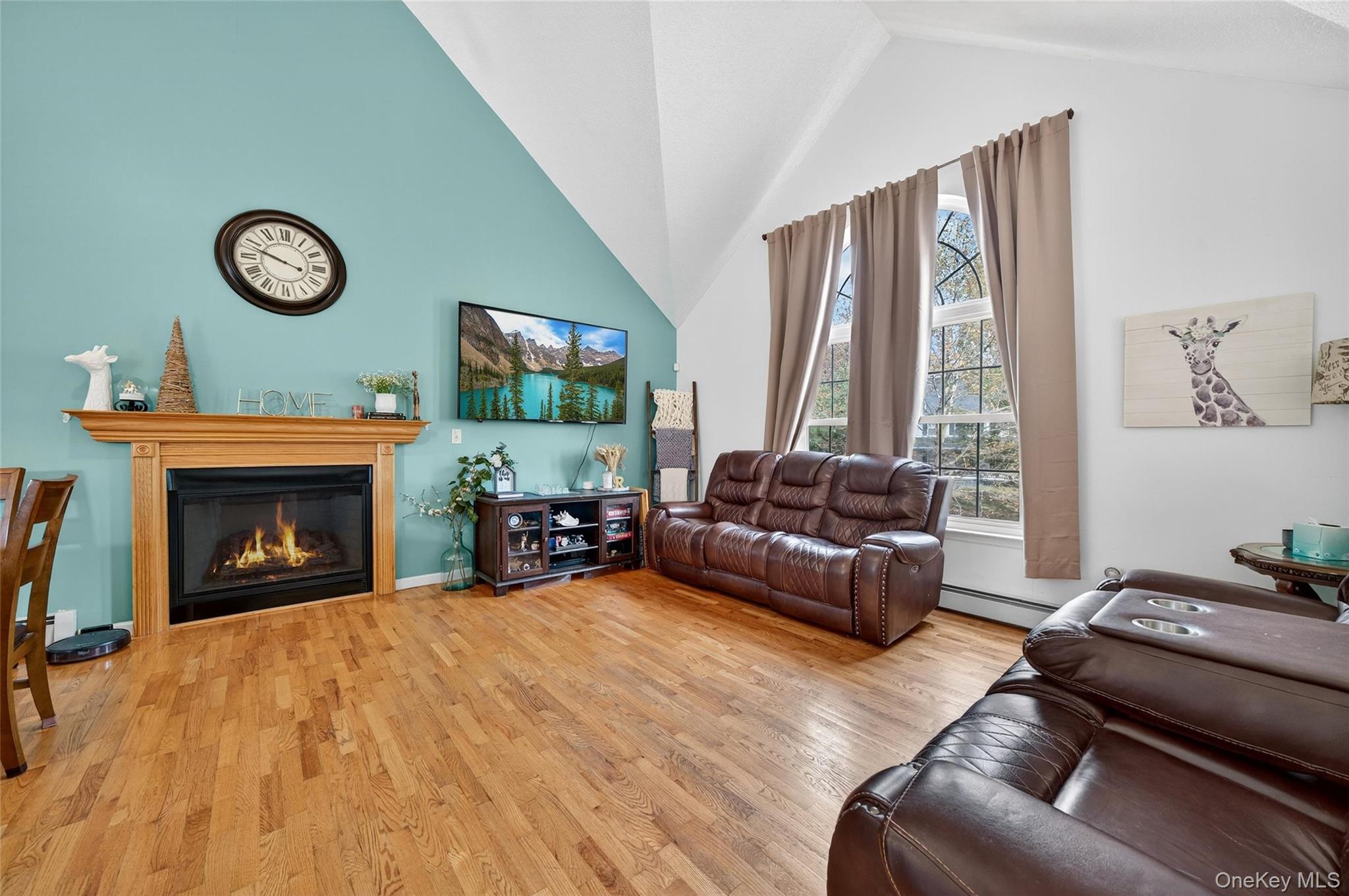 2 Berkeley Court Highland Mills, NY 10930 - Photo 6 of 44 a living room with furniture and a fireplace