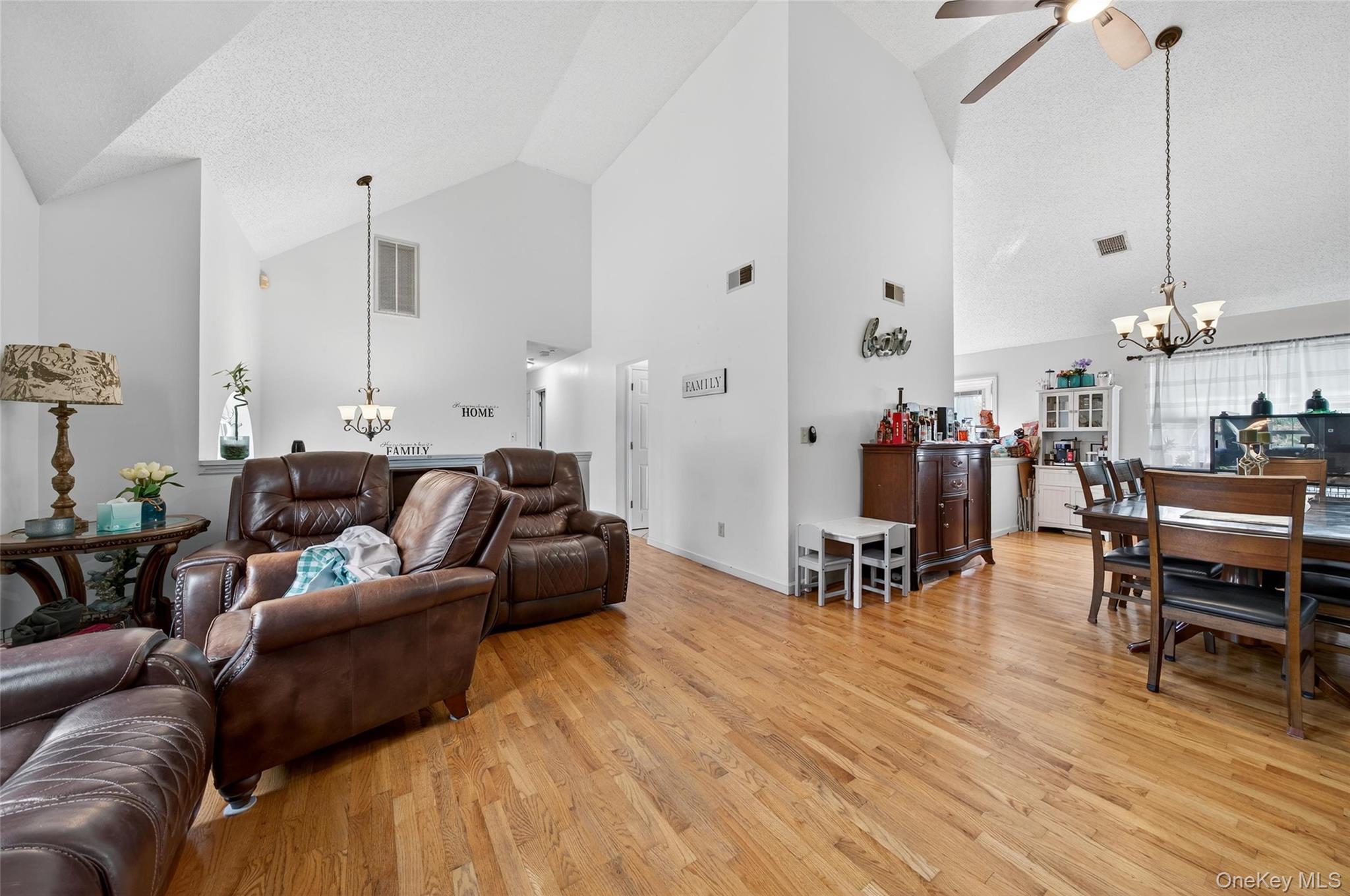 2 Berkeley Court Highland Mills, NY 10930 - Photo 9 of 44 a living room with furniture and wooden floor