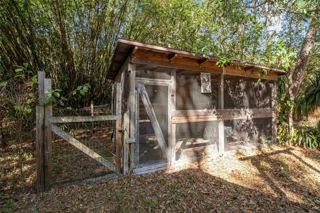 a kitchen with stainless steel appliances a refrigerator sink and cabinets