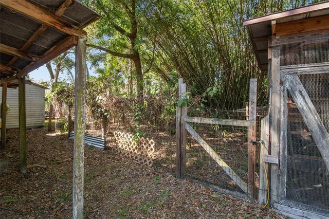 a kitchen with a refrigerator and cabinets