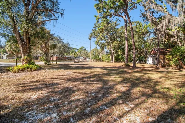 a bathroom with a sink toilet double vanity and shower