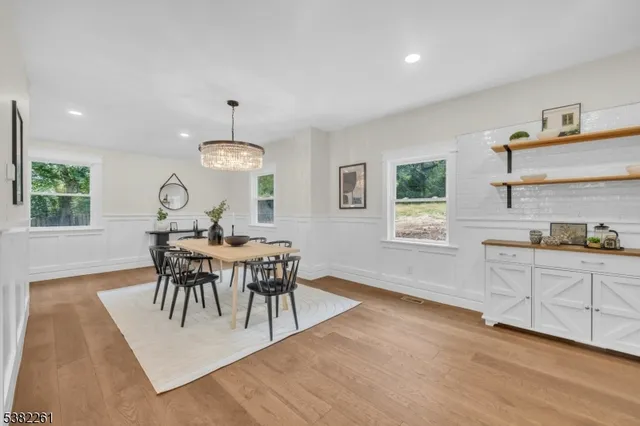 a spacious bedroom with a bed and a couch