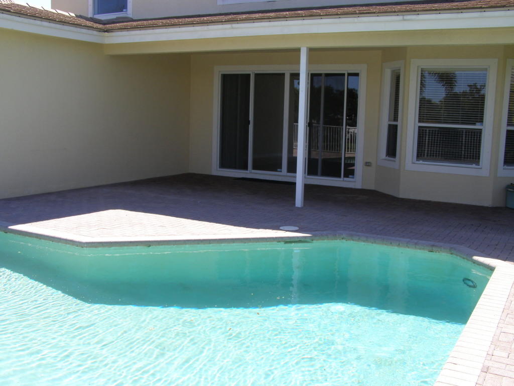 723 Southwest River Bend Circle Stuart, FL 34997 - Photo 23 of 39 Back Covered Porch