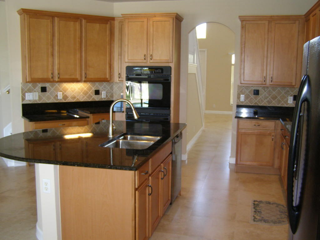 723 Southwest River Bend Circle Stuart, FL 34997 - Photo 8 of 39 Kitchen w center island