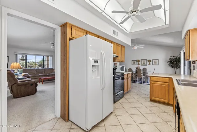 a view of living room with furniture and a chandelier