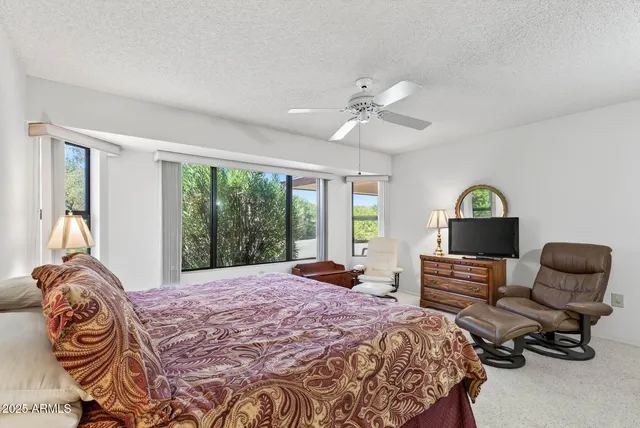 a bedroom with a bed and furniture