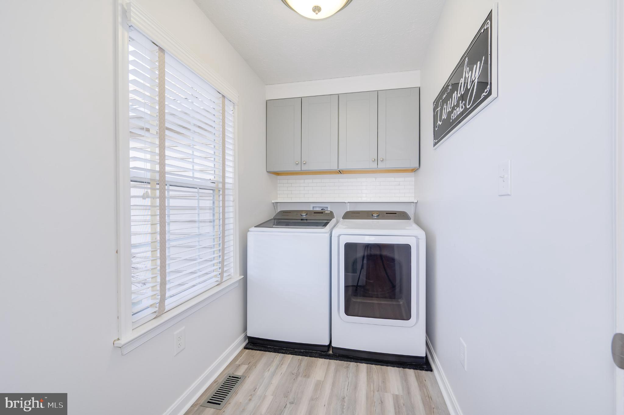 490 Renaissance Drive Martinsburg, WV 25403 - Photo 9 of 73 a utility room with dryer and washer