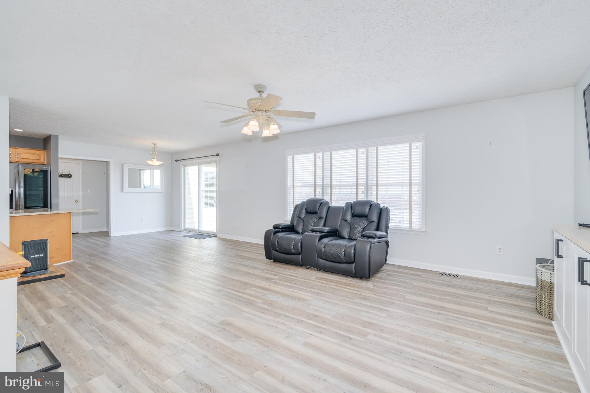 490 Renaissance Drive Martinsburg, WV 25403 - Photo 11 of 73 a living room with furniture and a wooden floor