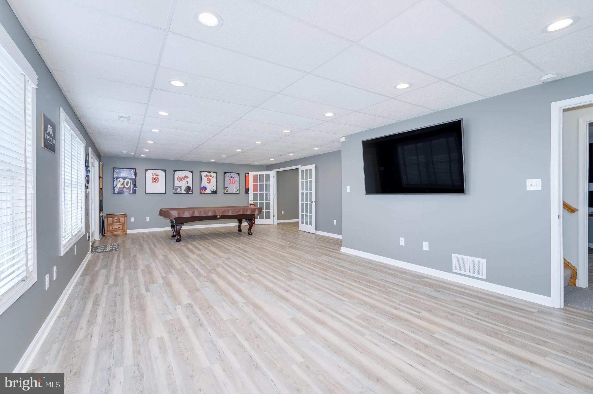 490 Renaissance Drive Martinsburg, WV 25403 - Photo 33 of 73 a view of kitchen with furniture and flat screen tv