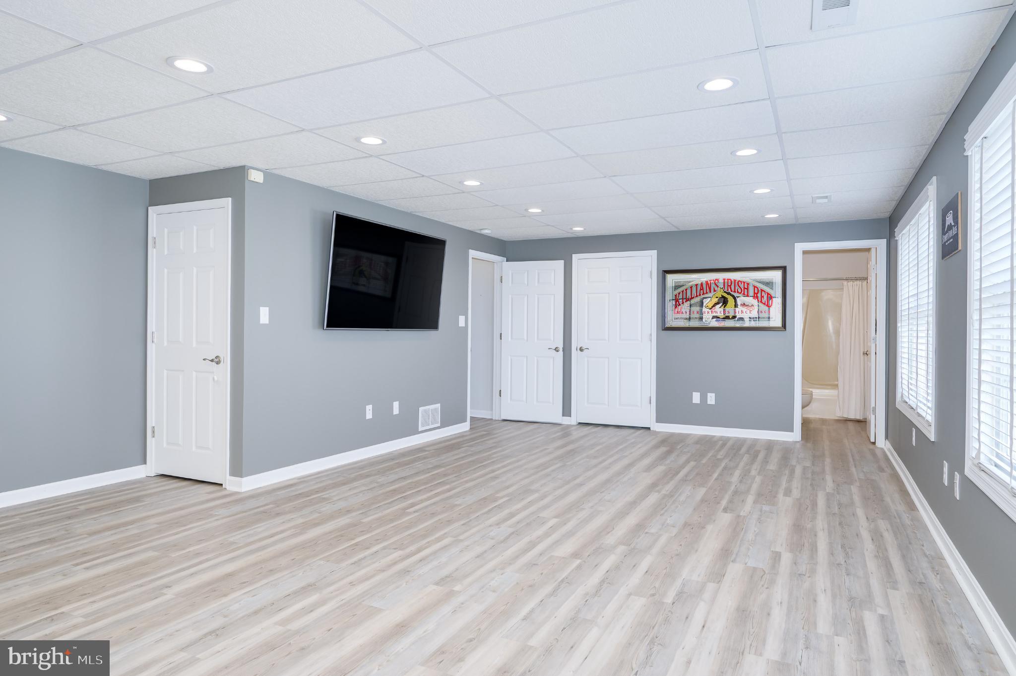 490 Renaissance Drive Martinsburg, WV 25403 - Photo 35 of 73 a view of an empty room with wooden floor