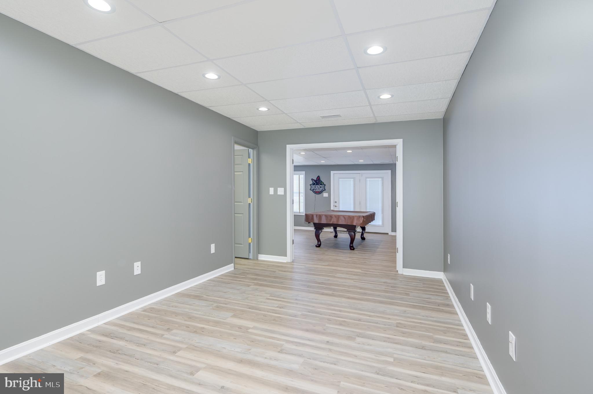 490 Renaissance Drive Martinsburg, WV 25403 - Photo 36 of 73 a view of kitchen and dining room with wooden floor