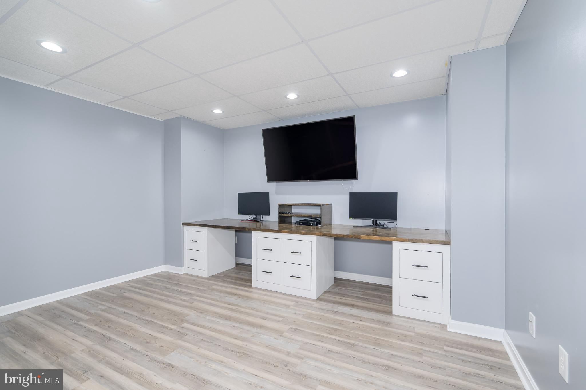 490 Renaissance Drive Martinsburg, WV 25403 - Photo 37 of 73 Modern workspace with sleek design elements.