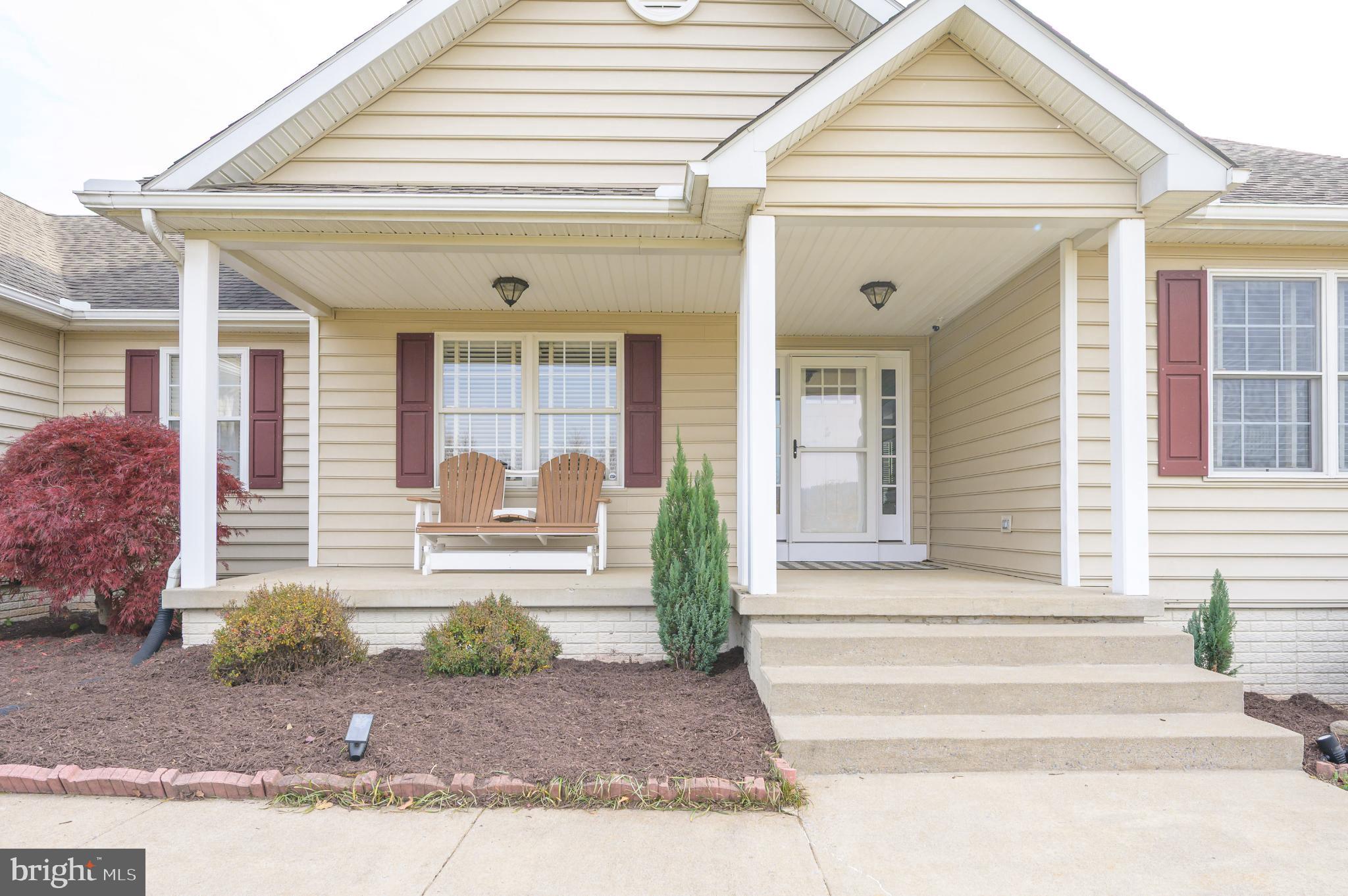 490 Renaissance Drive Martinsburg, WV 25403 - Photo 46 of 73 a front view of a house with a yard