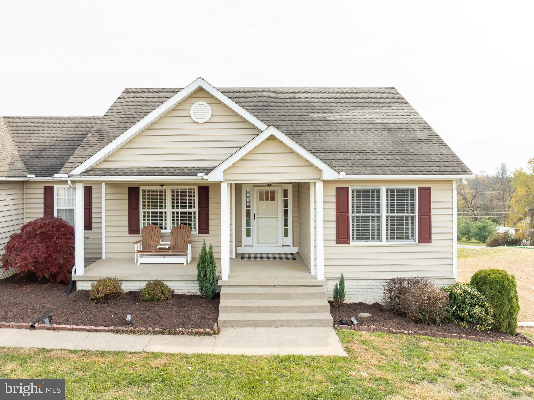 490 Renaissance Drive Martinsburg, WV 25403 - Photo 50 of 73 a front view of a house with a yard and outdoor seating