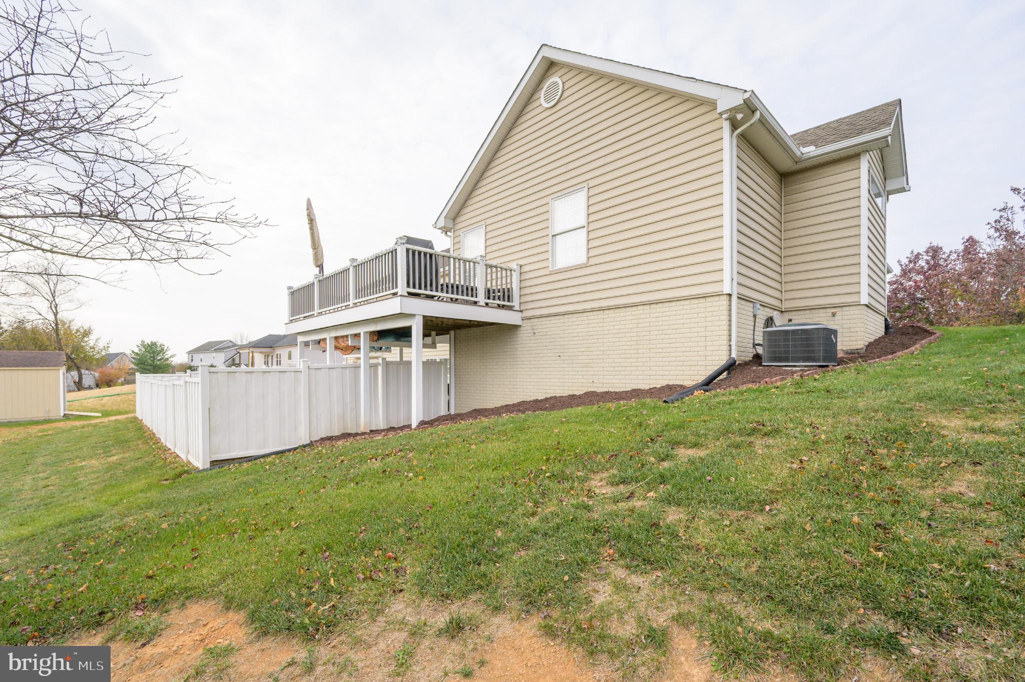 490 Renaissance Drive Martinsburg, WV 25403 - Photo 68 of 73 a view of a house with a yard and sitting area