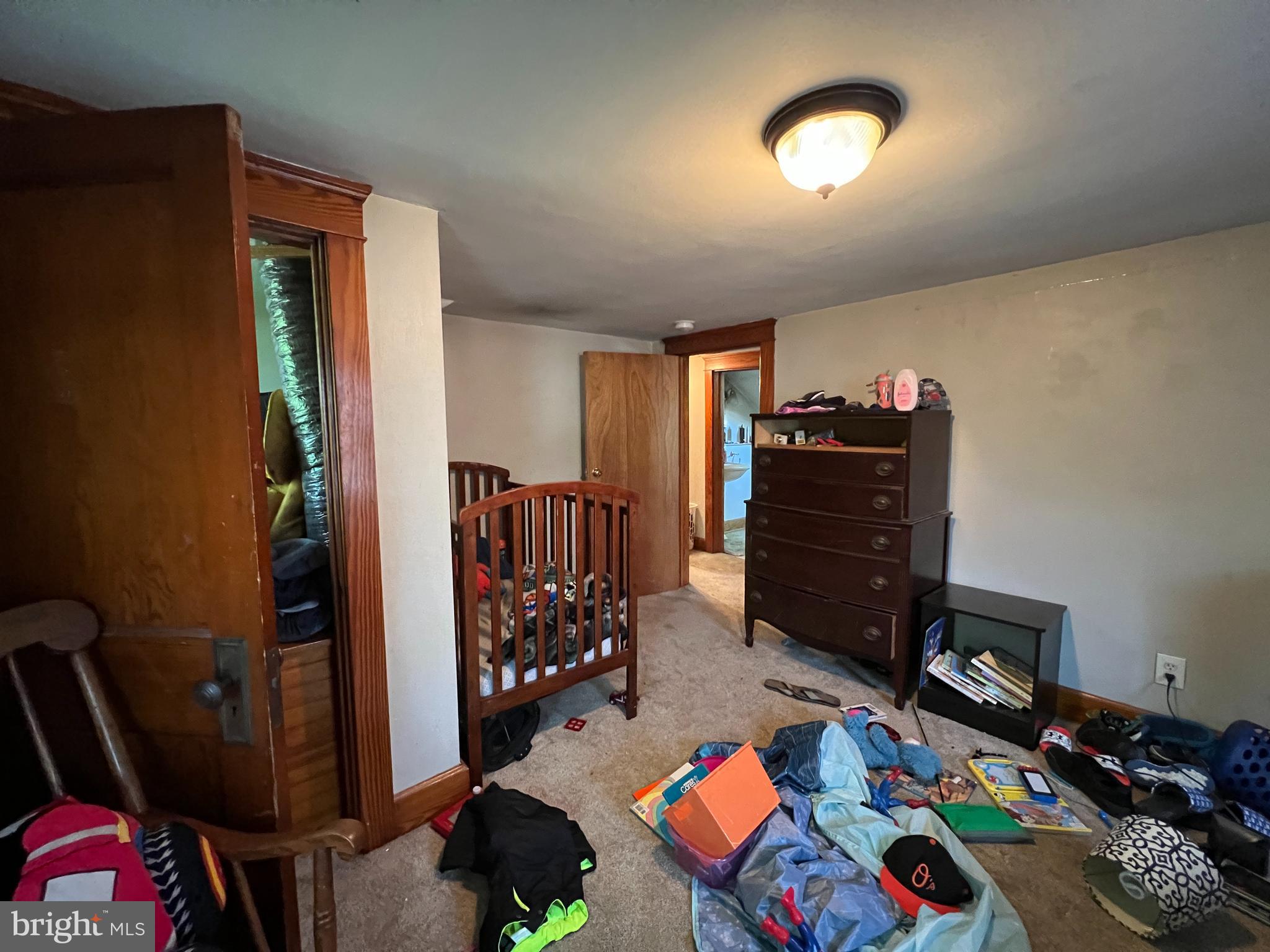 357 Blooming Grove Road Hanover, PA 17331 - Photo 23 of 39 a bed room with a bed and a television