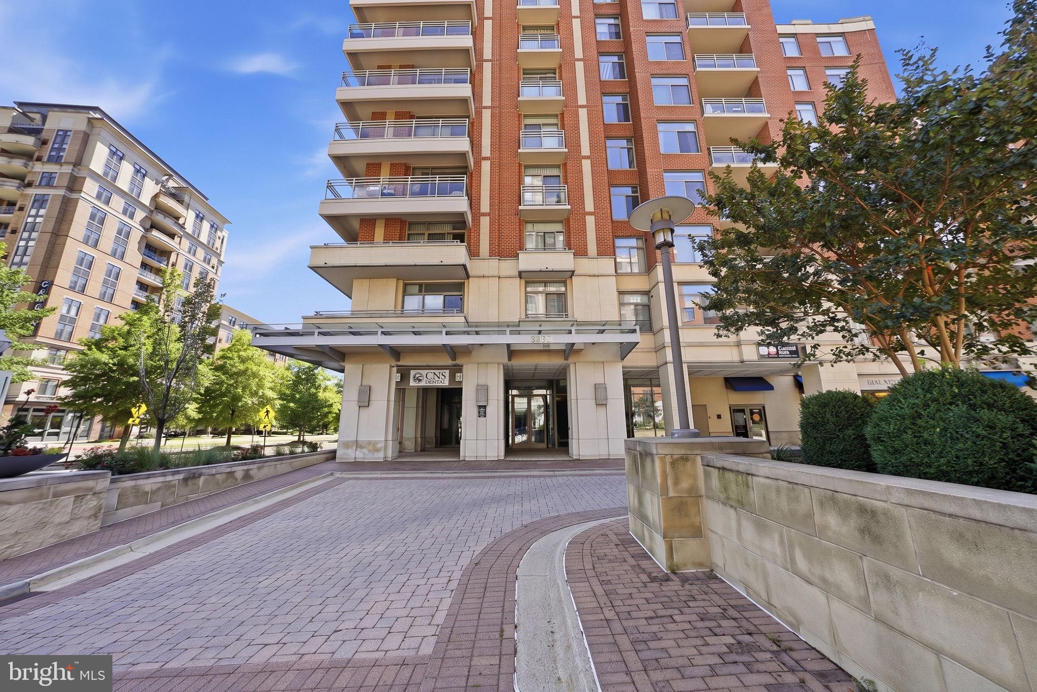 3650 South Glebe Road, Unit 1145 Arlington, VA 22202 - Photo 35 of 42 a front view of a building with a garden