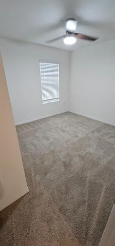 a kitchen with a sink stove and refrigerator