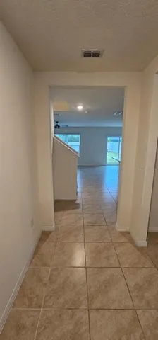 a kitchen with granite countertop a stove and a sink