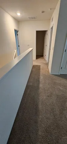 a view of hallway and kitchen