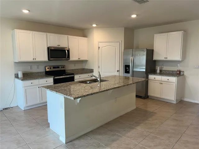 a view of a yard with an outdoor space