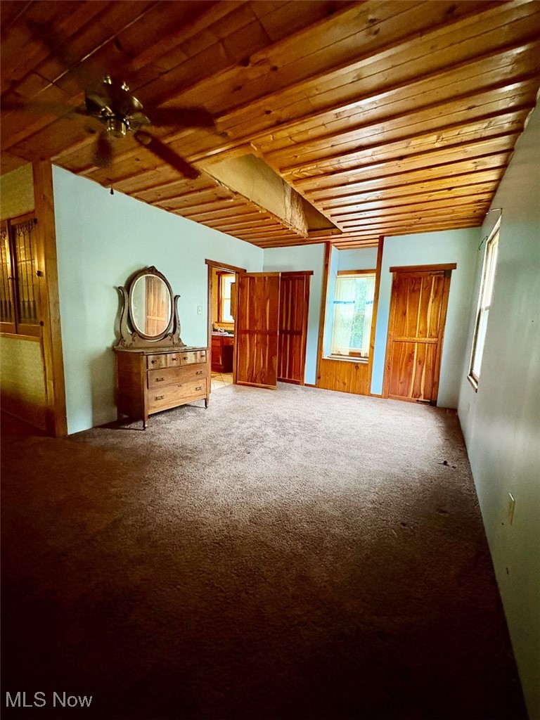 82755 Laughlin Road Tippecanoe, OH 44699 - Photo 30 of 35 Bedroom featuring carpet, ceiling fan, and wood ceiling