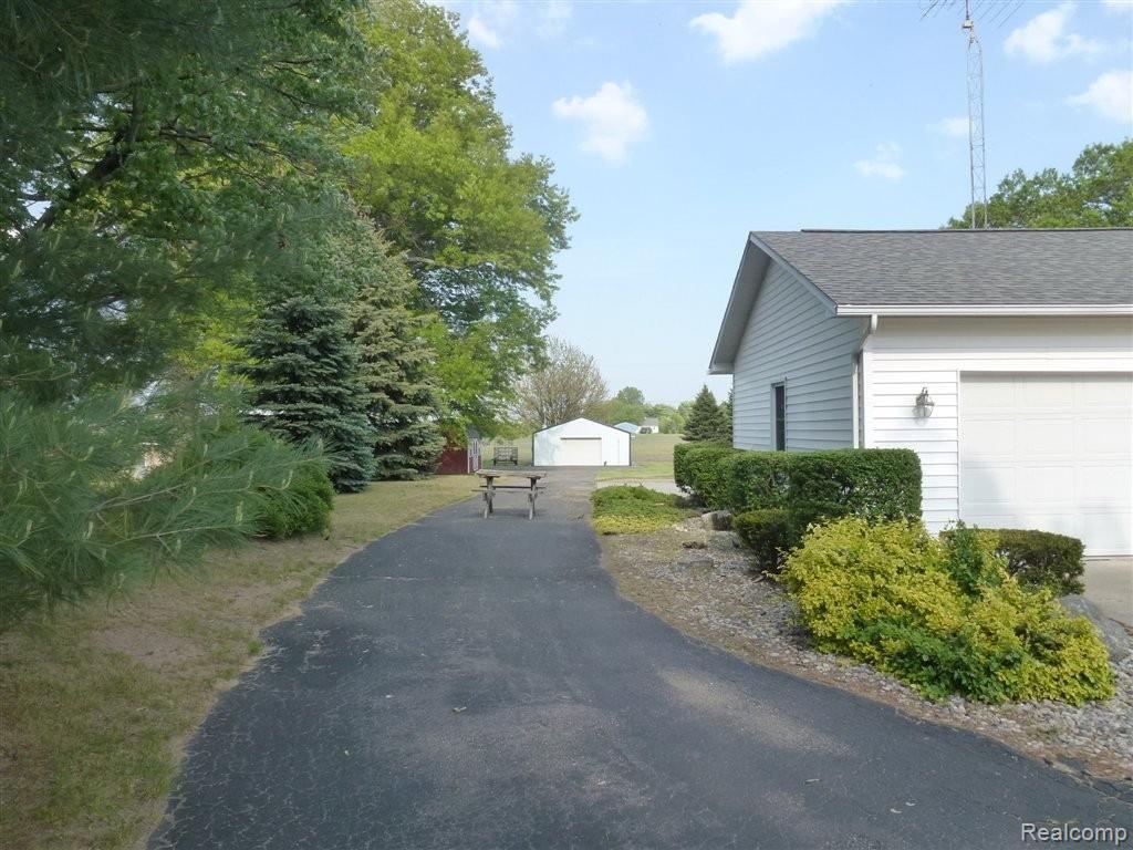 11040 Exeter Road Carleton, MI 48117 - Photo 13 of 23 SIDE DRIVE.JPG