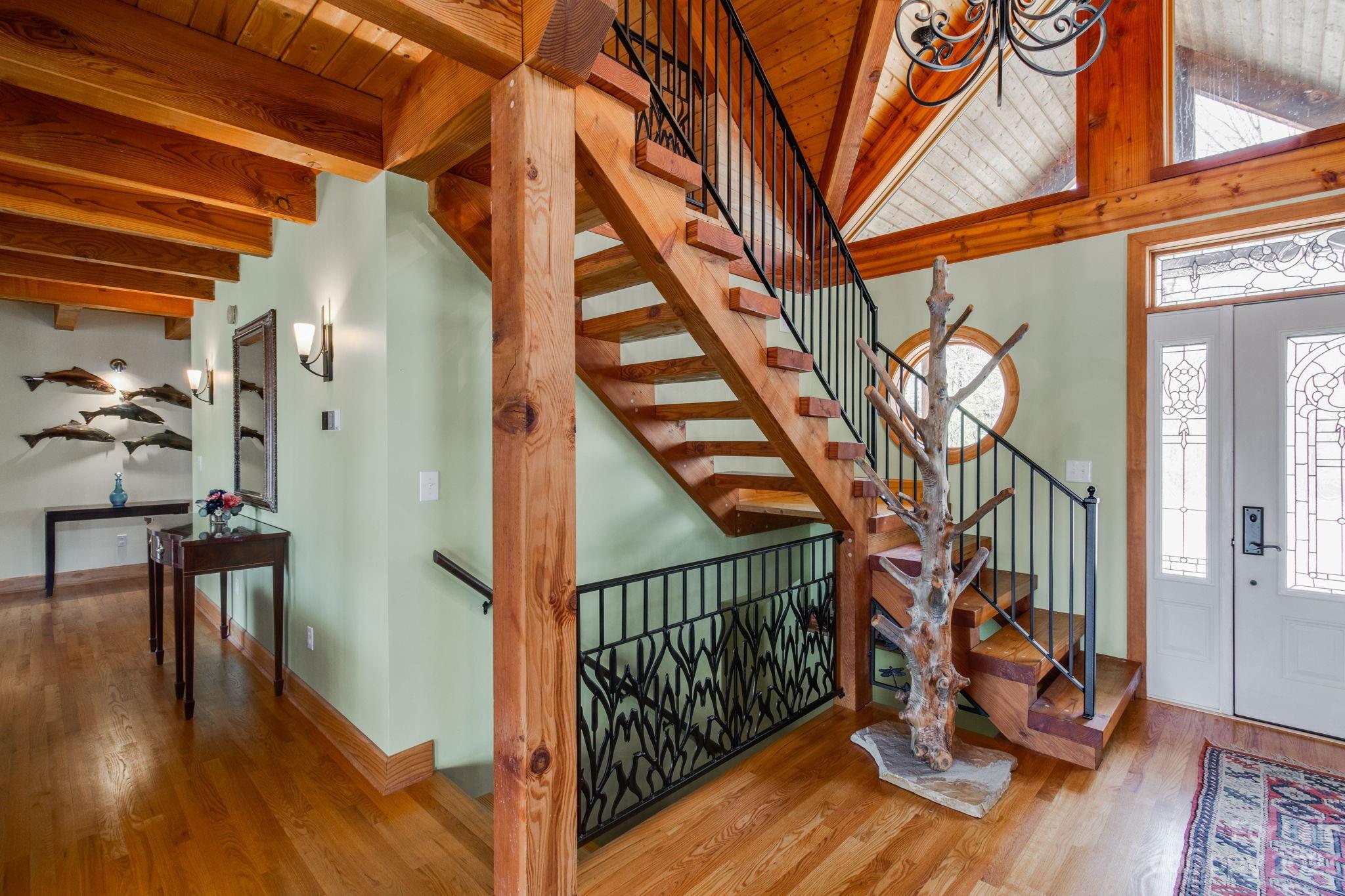 2709 Rolling Hills Road Ridgeway, SC 29130 - Photo 29 of 48 a view of entryway with wooden floor and a front door