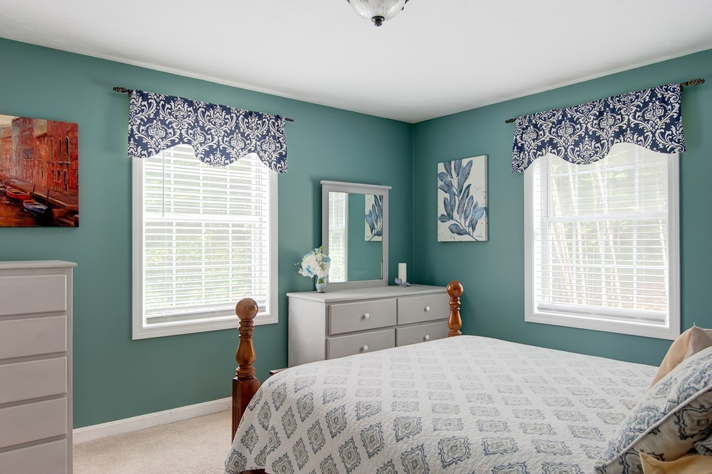 6 Vinton Road Sturbridge, MA 01566 - Photo 18 of 20 a bedroom with a large bed and a window