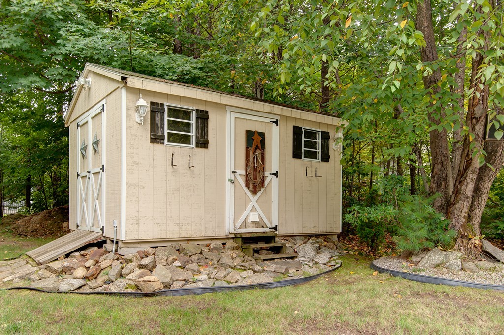 6 Vinton Road Sturbridge, MA 01566 - Photo 5 of 20 a view of a house with backyard