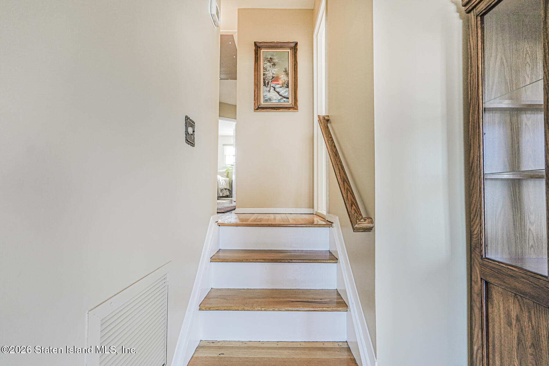 76 Berry Avenue Staten Island, NY 10312 - Photo 15 of 42 a view of staircase with white walls