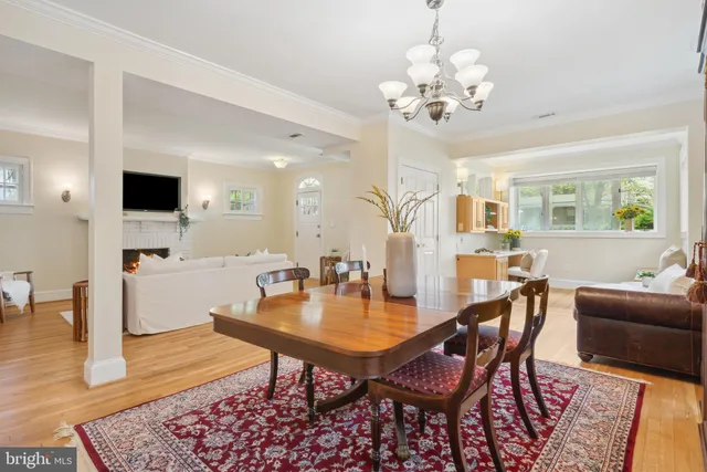 a kitchen with stainless steel appliances granite countertop a sink a stove and cabinets