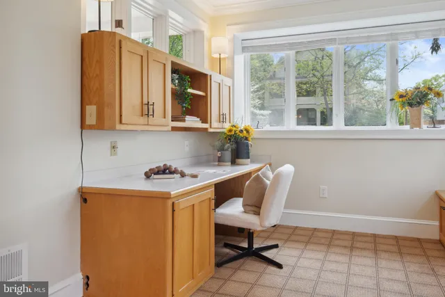 a view of a house with a large window