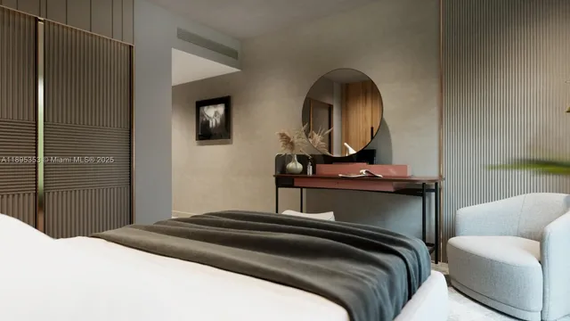 a bedroom with a bed and a mirror