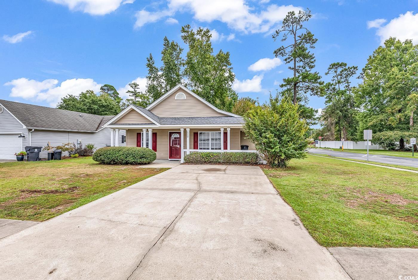 1900 Shell Court Surfside Beach, SC 29575 - Photo 1 of 32 View of front of home driveway, yard and covered f