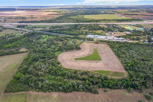 a view of a yard with furniture