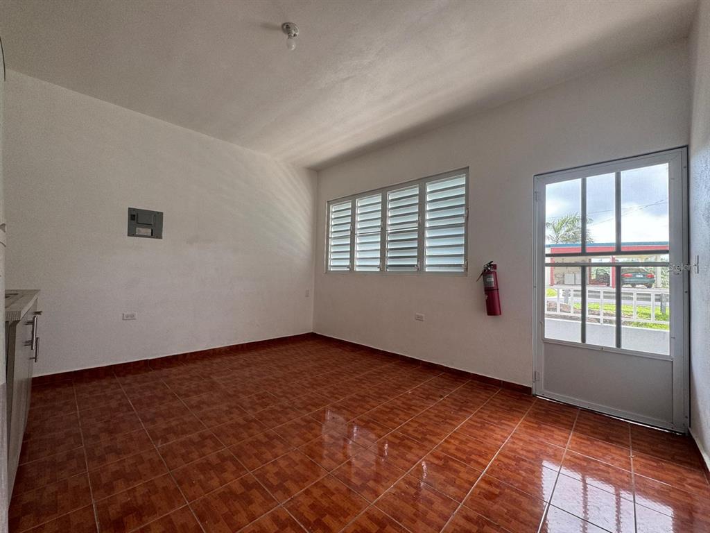 908 Bo Tejas, Unit 7 Humacao, PR 00791 - Photo 3 of 7 an empty room with windows