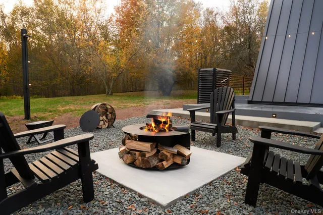 a view of a patio with two chairs