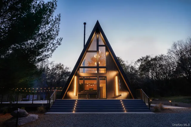 a view of entryway with wooden floor and door