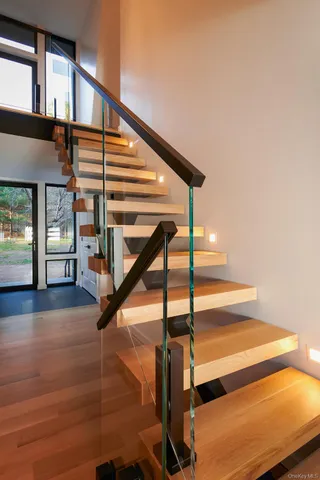 a room with furniture and flat screen tv