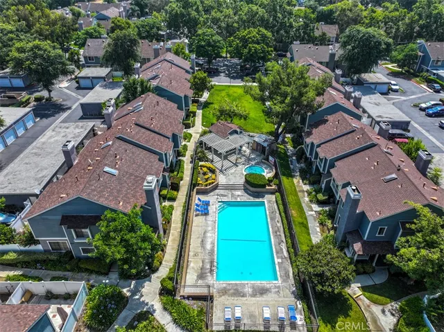an aerial view of a city with lots of residential buildings