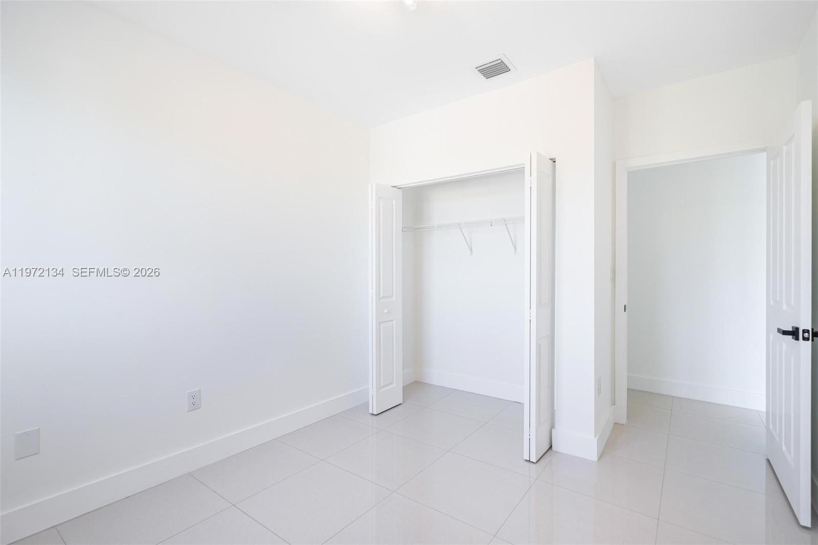 2280 Southwest 32nd Avenue, Unit 201 Miami, FL 33145 - Photo 19 of 23 a view of an empty room