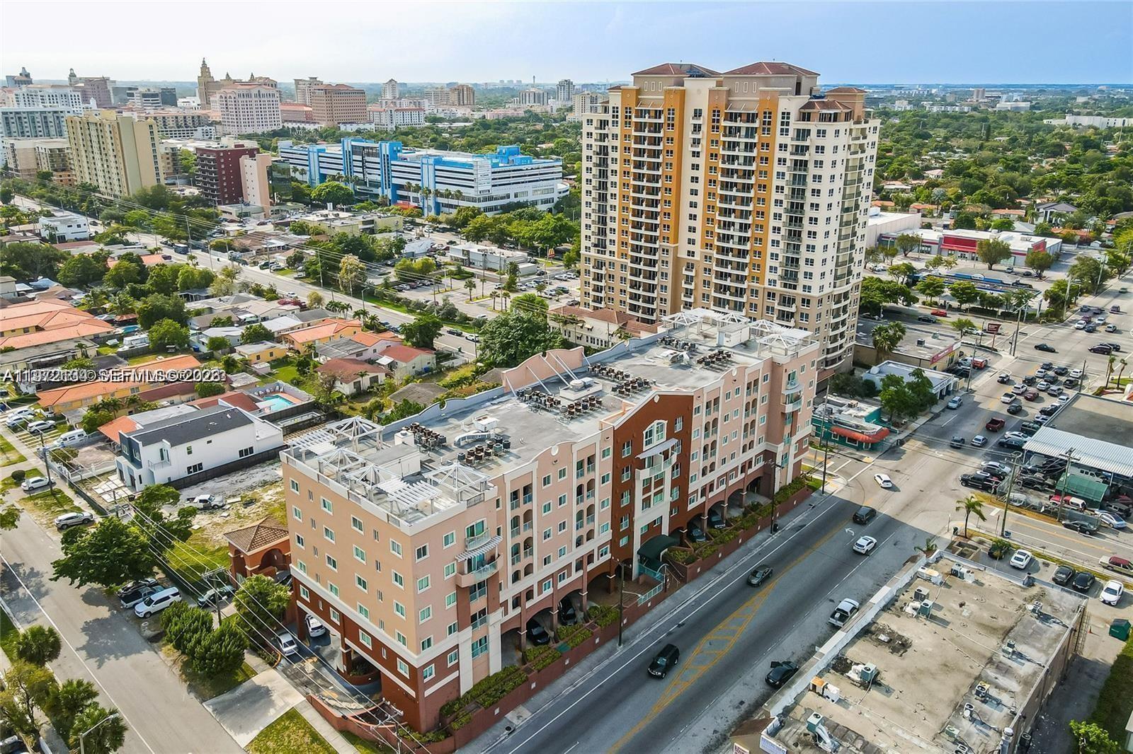 2280 Southwest 32nd Avenue, Unit 201 Miami, FL 33145 - Photo 23 of 23 a view of a city with tall buildings