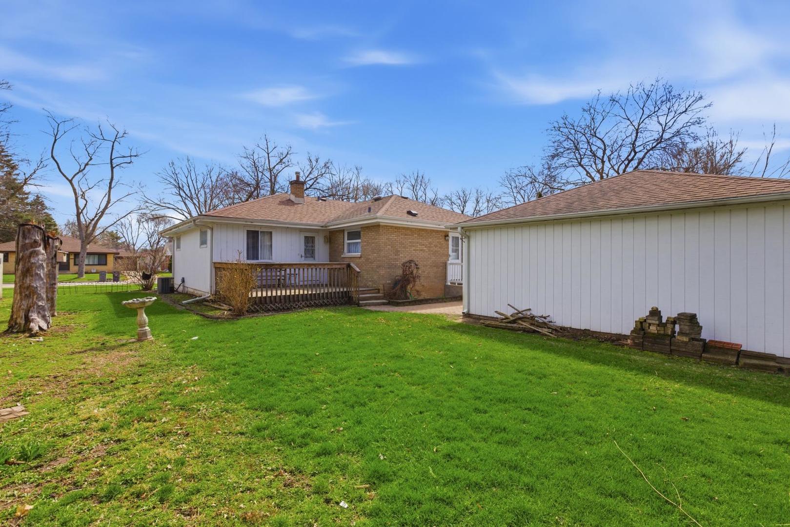 700 Ford Avenue Elgin, IL 60120 - Photo 20 of 20 a view of a house with a backyard