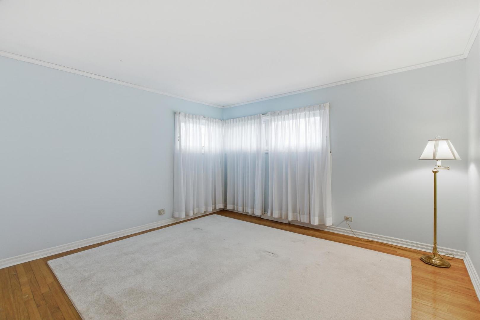 700 Ford Avenue Elgin, IL 60120 - Photo 10 of 20 an empty room with fan
